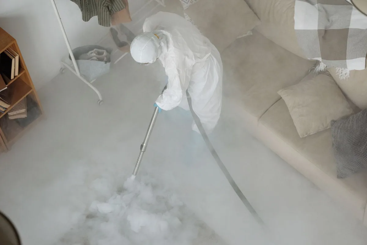 Biohazard cleanup technician in protective equipment, Cedarville, OH